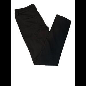 Chicos size 1. Black polyester pants somewhat a jegging.